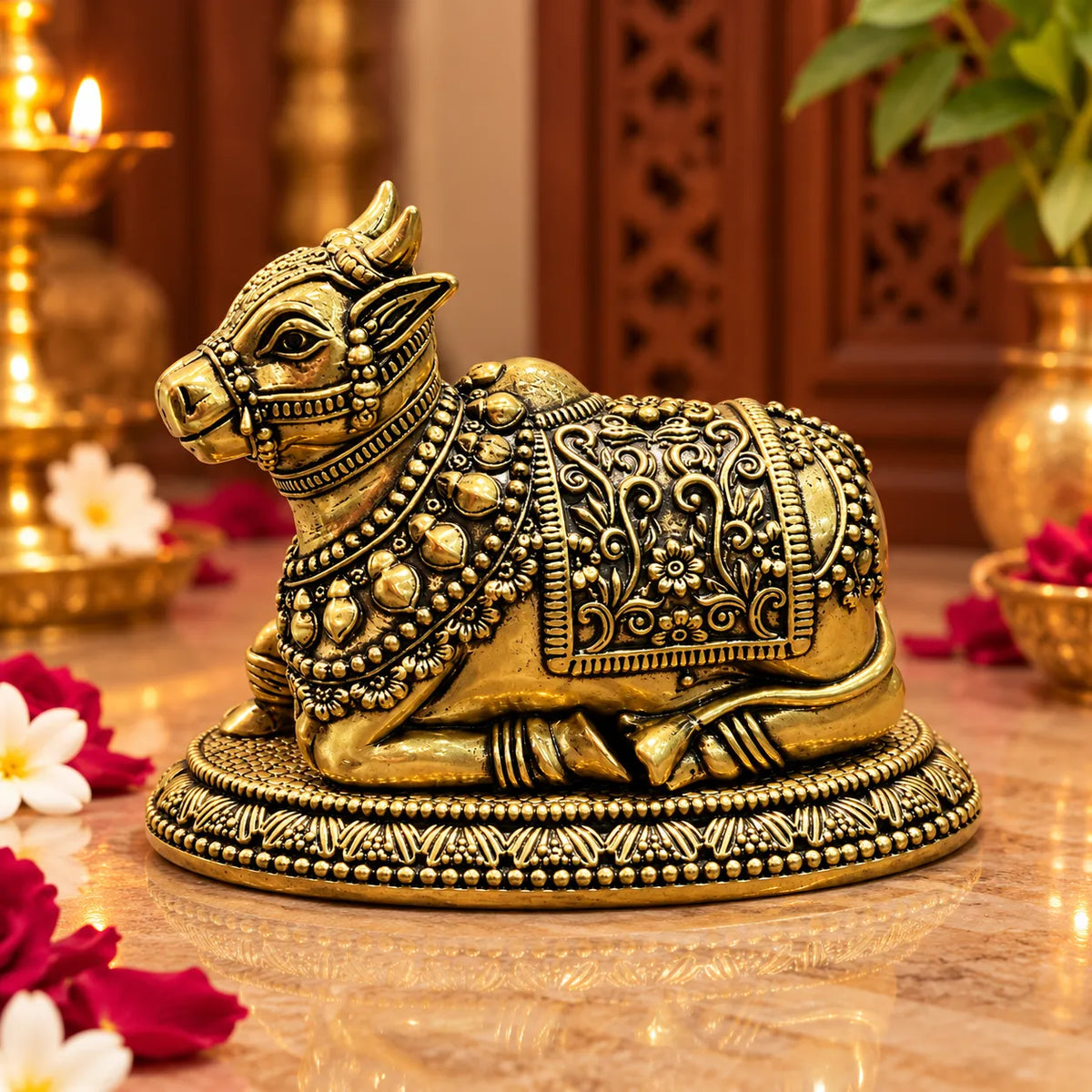Antique Golden Brass Nandi Bull Idol with Floral Carvings & Ornate Oval Base