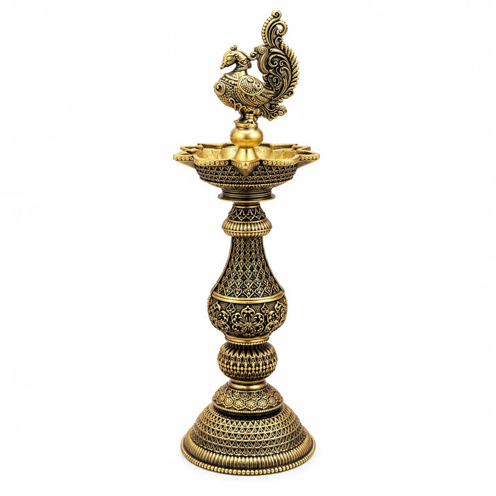 Antique Brass Peacock Diya Stand with Intricate Traditional Carving