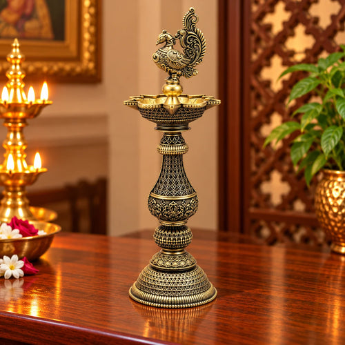 Antique Brass Peacock Diya Stand with Intricate Traditional Carving