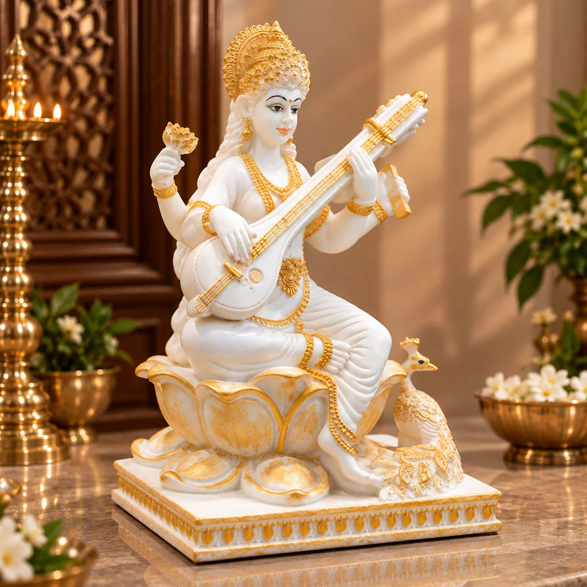 White & Gold Goddess Saraswati Idol with Veena and Peacock