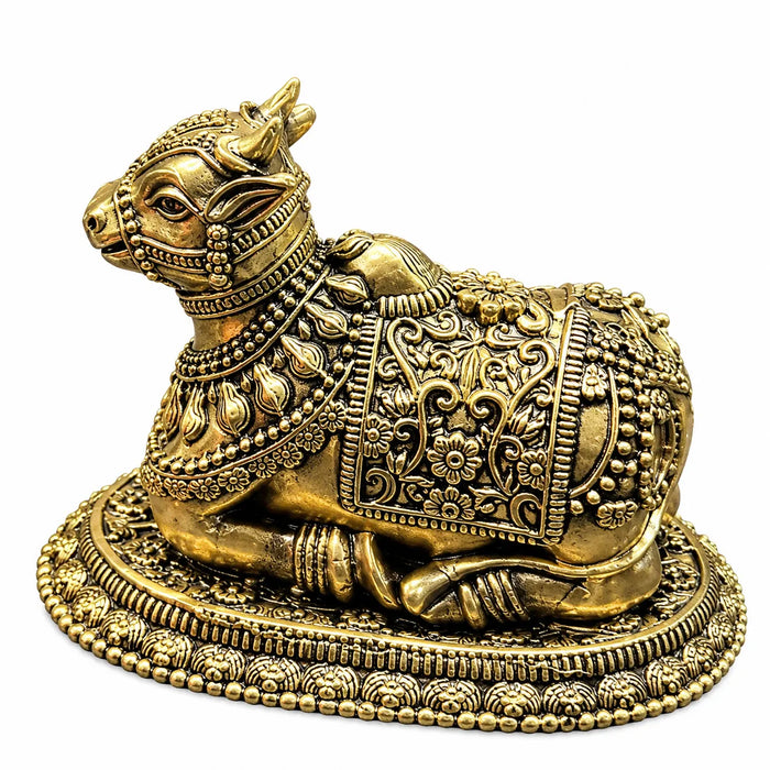 Antique Golden Brass Nandi Bull Idol with Floral Carvings & Decorative Oval Base